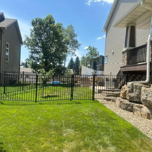 While the backyard pool steals the spotlight, the north side of the home offers its own peaceful escape. A wraparound deck leads to a charming patio and intimate yardâideal for a cafÃ© table, quiet mornings, or evening relaxation.