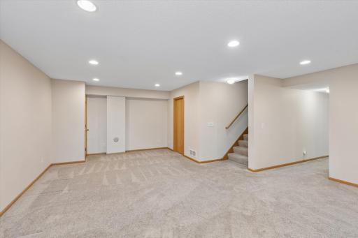 Door leads to large storage room in unfinished space
