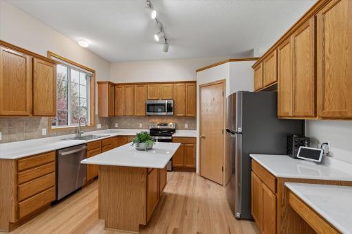 Note convenient walk-in pantry in kitchen