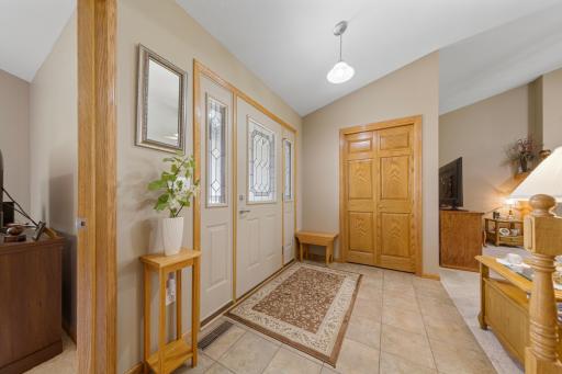 Large entry foyer with coat closet for guests