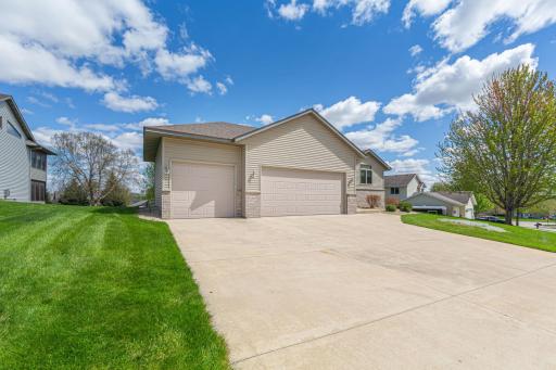 Large attached three car garage. Note the large garage door is 18 by 8