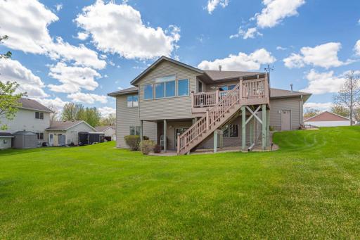 Steps from the composite deck to the backyard