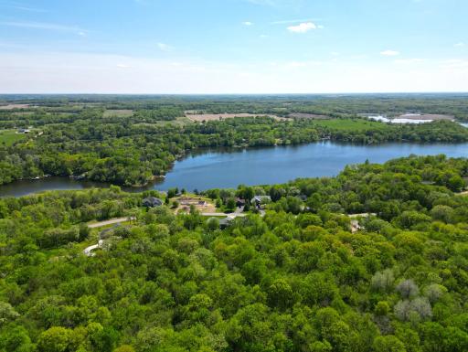 This lot offers over one acre of wooded peacefulness and south-westerly views of Lake Louisa.
