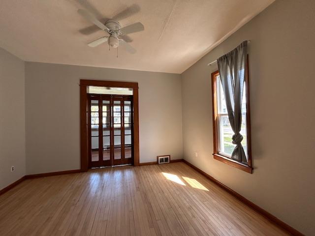 712 6th Main LR Sunroom MLS.JPG