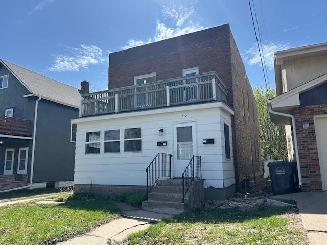 712 6th Ext Front MLS.JPG