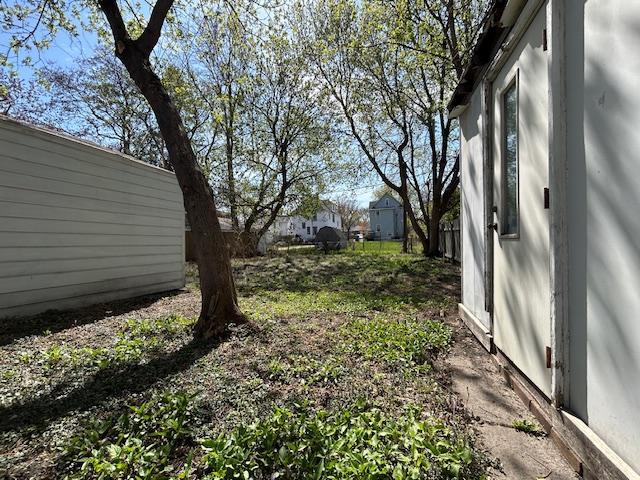 712 6th Shed Backyard MLS.JPG