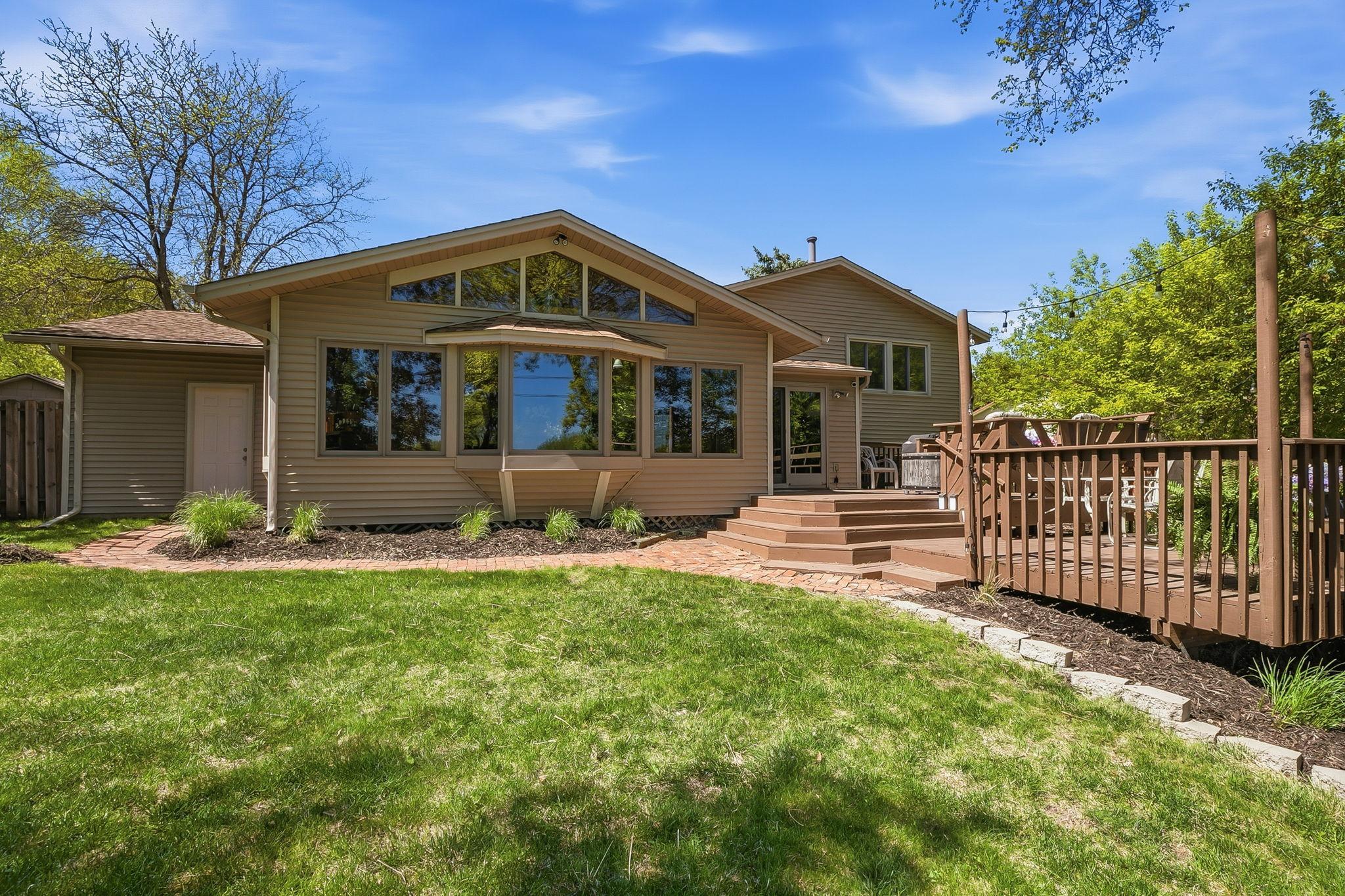 The back of house views are incredible. Enjoy your expanded deck and views of the lake from your Andersen windows.