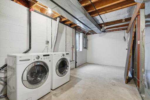 Laundry is a breeze in this lower-level space with added storage