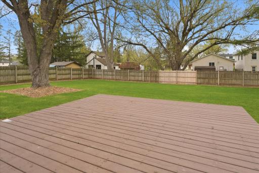 An ideal setting with lush green space and fresh landscaping, perfect for relaxing, entertaining, or enjoying the outdoors