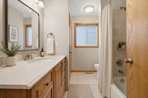 Stylishly updated full bathroom conveniently located on the upper level