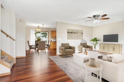 Natural light takes center stage in this welcoming living room with oversized windows