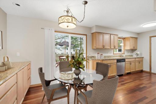 Fresh paint throughout pairs beautifully with wood flooring on both the main level and lower-level family room