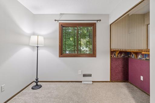 Upper-level bedroom could double as an office
