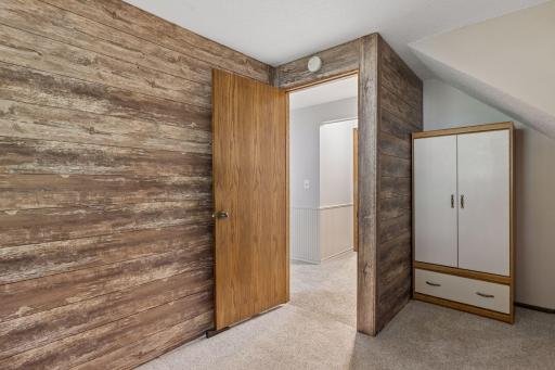 Finished under stairs storage perfect for a hobby or playroom