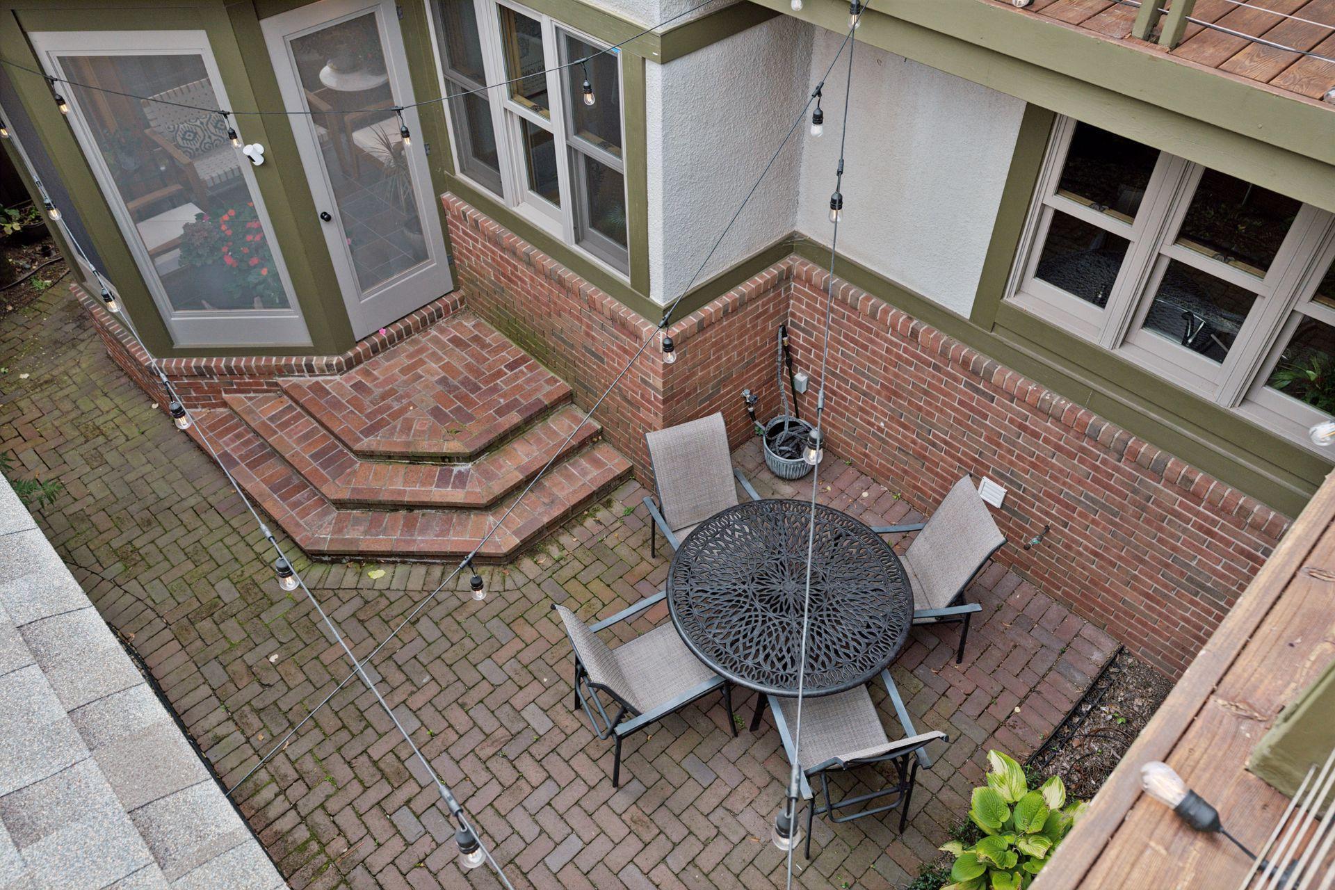 Upper level deck overlooks main level patio