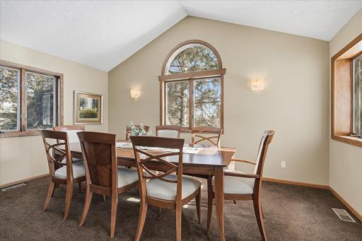 Vaulted Formal Dining Room w/two large windows for lots of natural light