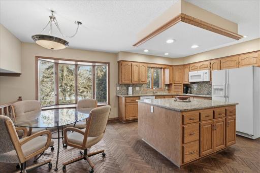 Open Kitchen with granite counter tops and backsplash. Open Informal Dining Room.
Numerous pullouts inside the cabinets