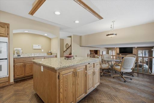 Open Kitchen and Informal Dining Room into the Family Room