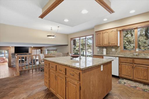 Open Kitchen and Informal Dining Room into the Family Room