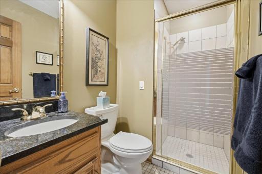 Main level updated Â¾ Bathroom features: granite top vanity, full wall/floor tile shower w/glass door and tile. Great for family or guests staying in 3rd Bedroom