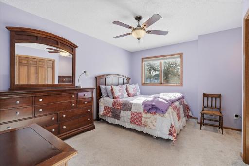 Upper Level 2nd Bedroom with ceiling fan/light, large closet and window