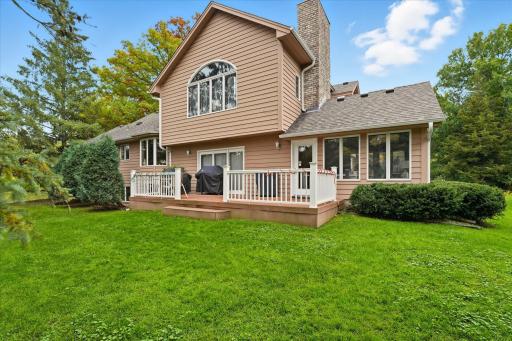 Family Room sliders to maint-free deck for easy access to backyard. Irrigation sprinkler system