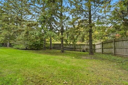 Private .43 acre lot with partial wood privacy fenced backyard (fence maintained by owner of property). Quiet cul-de-sac location