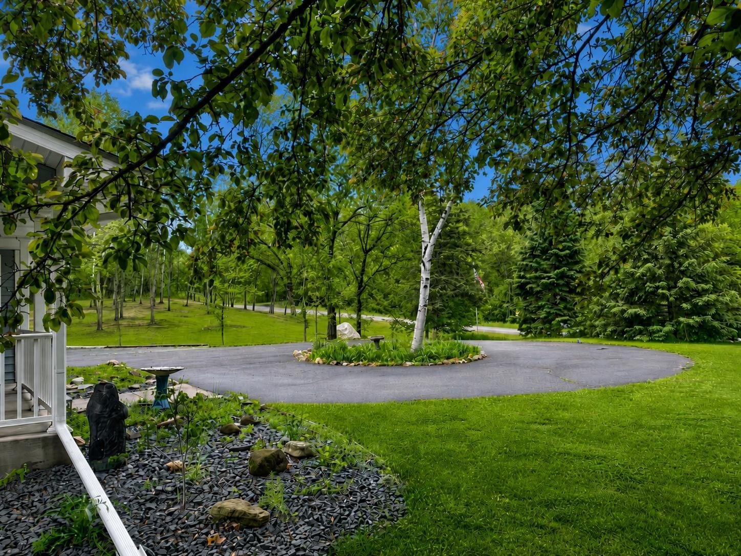 Mature trees and quiet surroundings create a setting where nature feels part of everyday life.