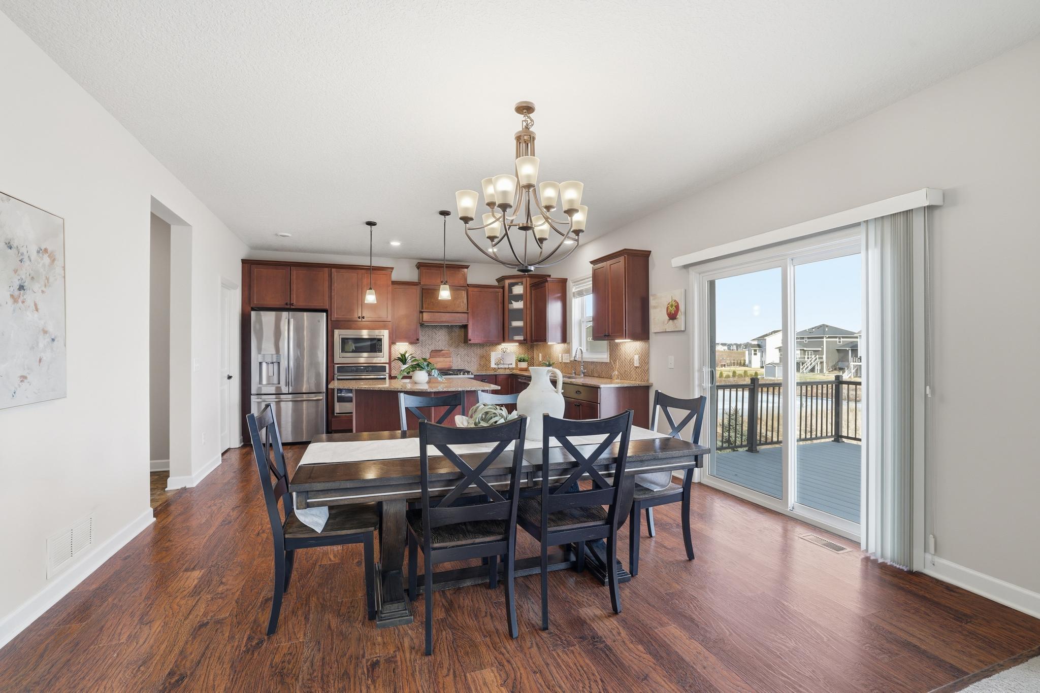 Patio doors open to a maintenance free deck