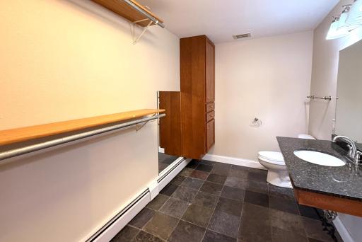 Primary en-suite with walk-in closet/storage