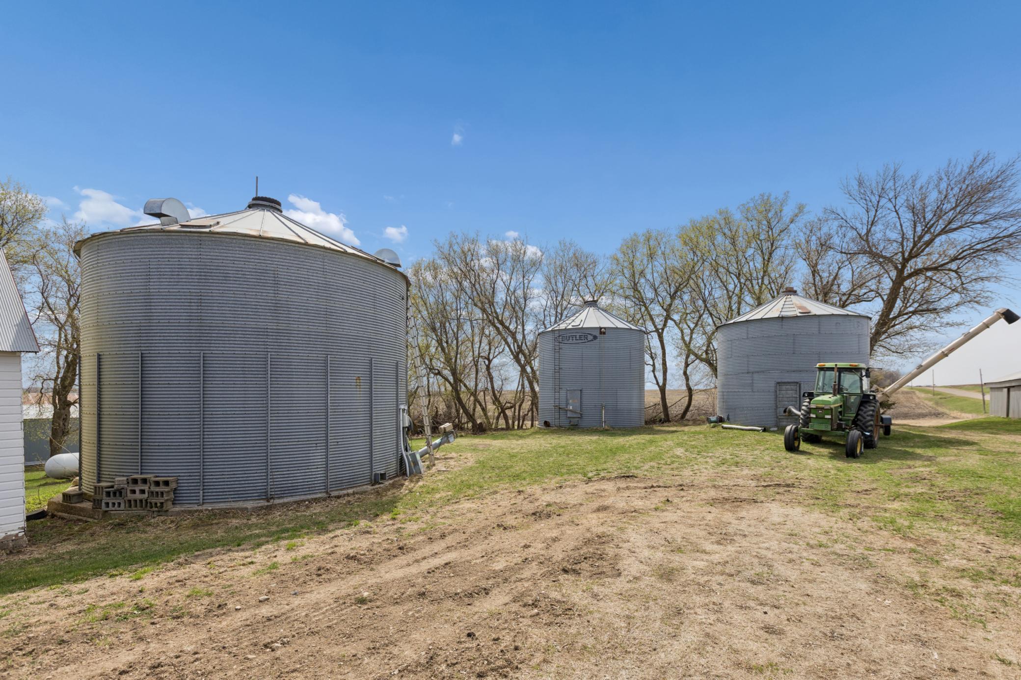 Grain bins with dryer