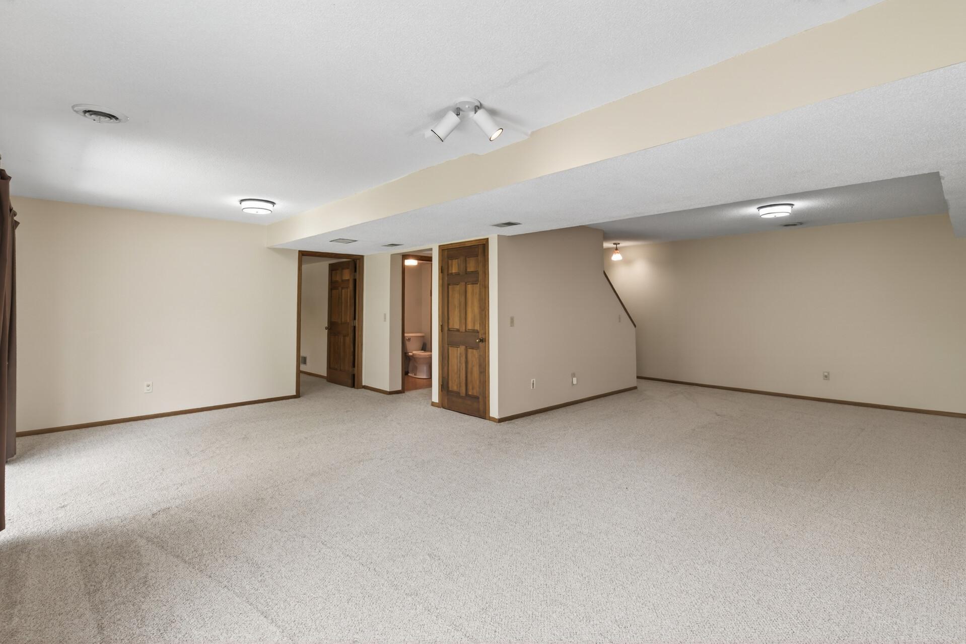 Lower level family room - wonderful space for entertaining.