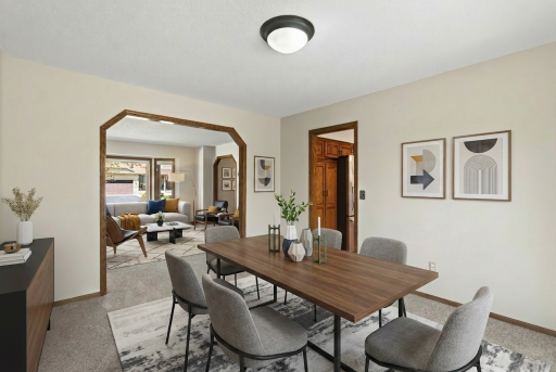Virtually staged main floor formal dining room and front sitting room
