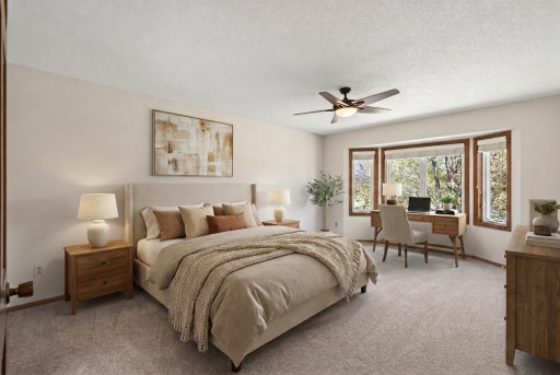 Virutally staged primary bedroom on upper level.