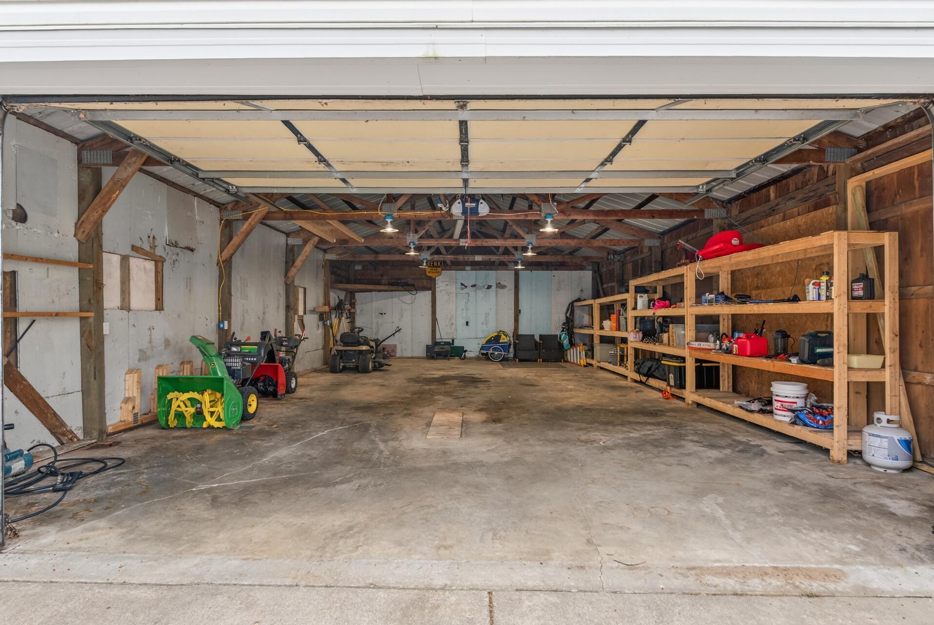 Concrete floor and storage in the pole shed.