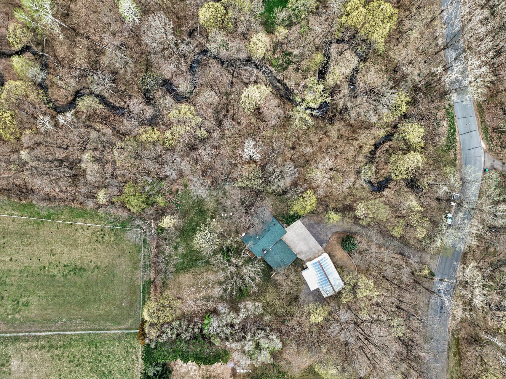 Creek runs along the north side of the property.
