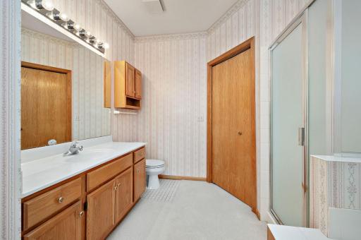 Primary Suite has a private full bath equipped with a jetted tub and separate shower