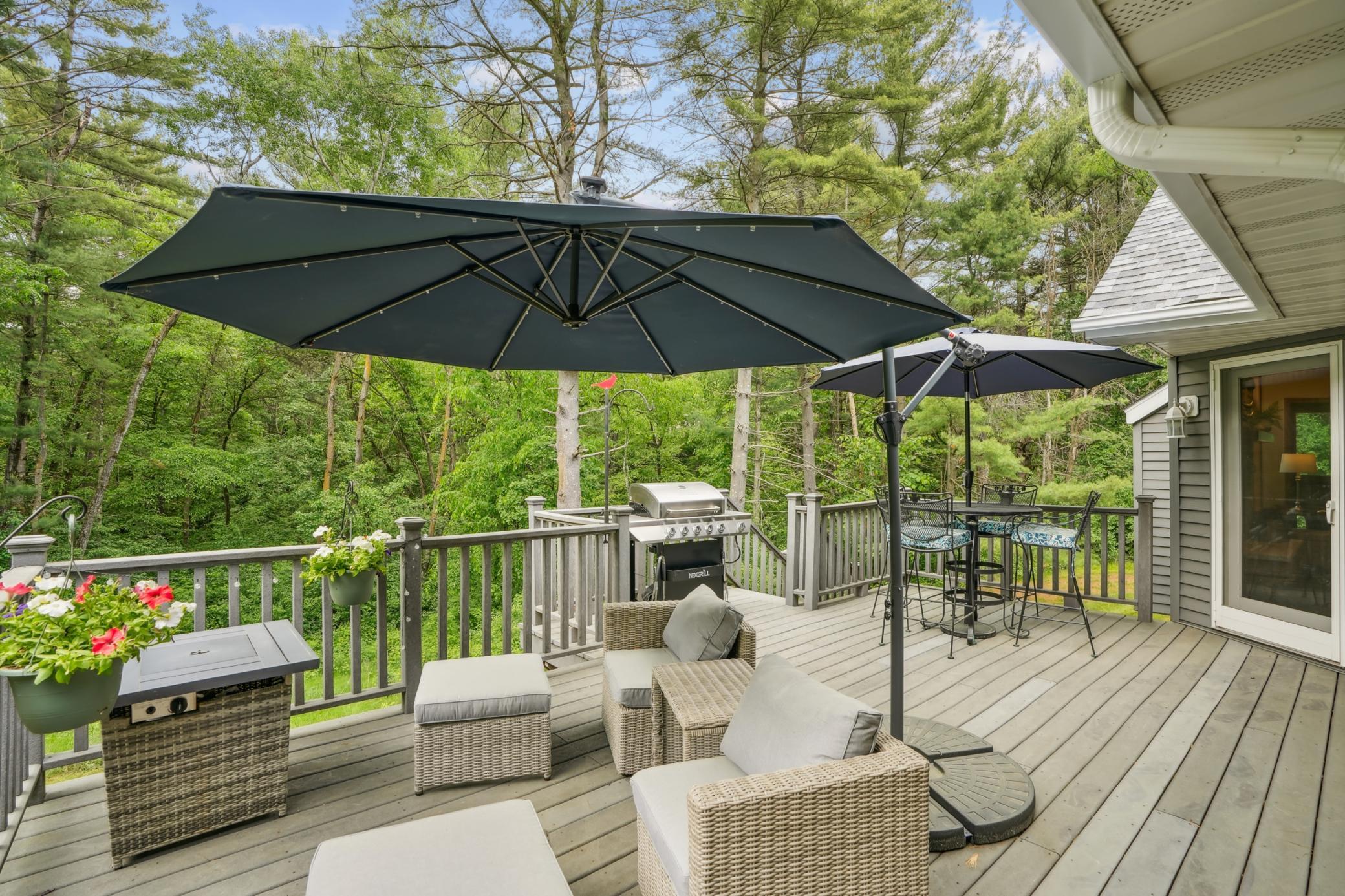 Spacious deck perfect for outdoor dining, relaxing, and entertaining.jpg