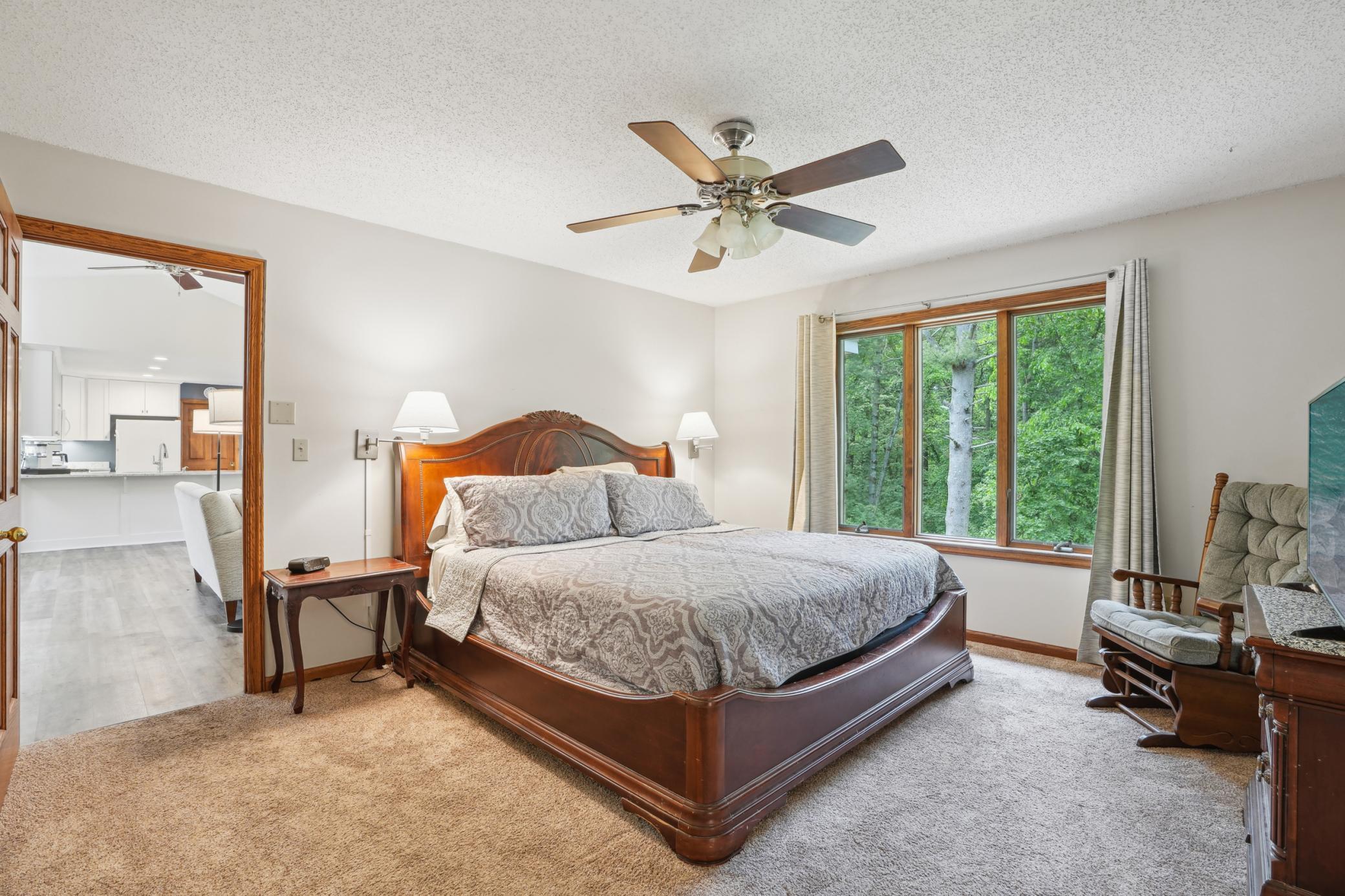 Bright primary suite with private ensuite bath and comfortable layout.jpg