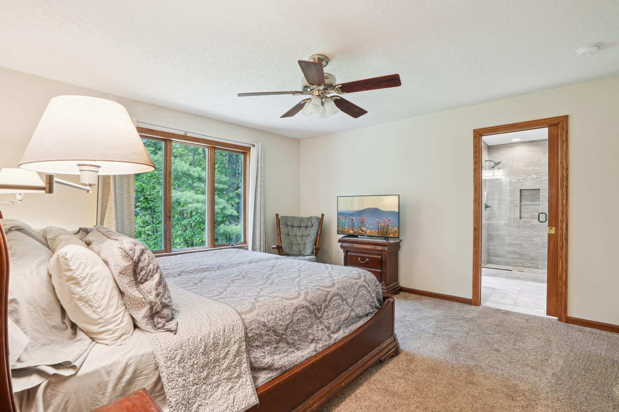 Enjoy main floor living with a spacious primary bedroom and ensuite..jpg