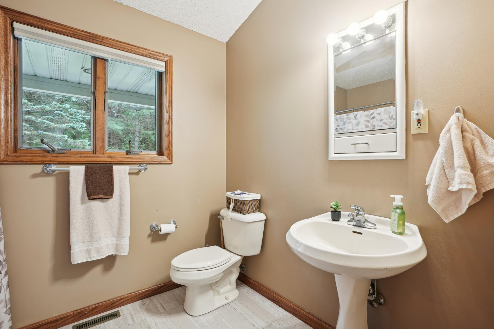 Well-placed main floor full bathroom offering everyday convenience for guests and daily living..jpg