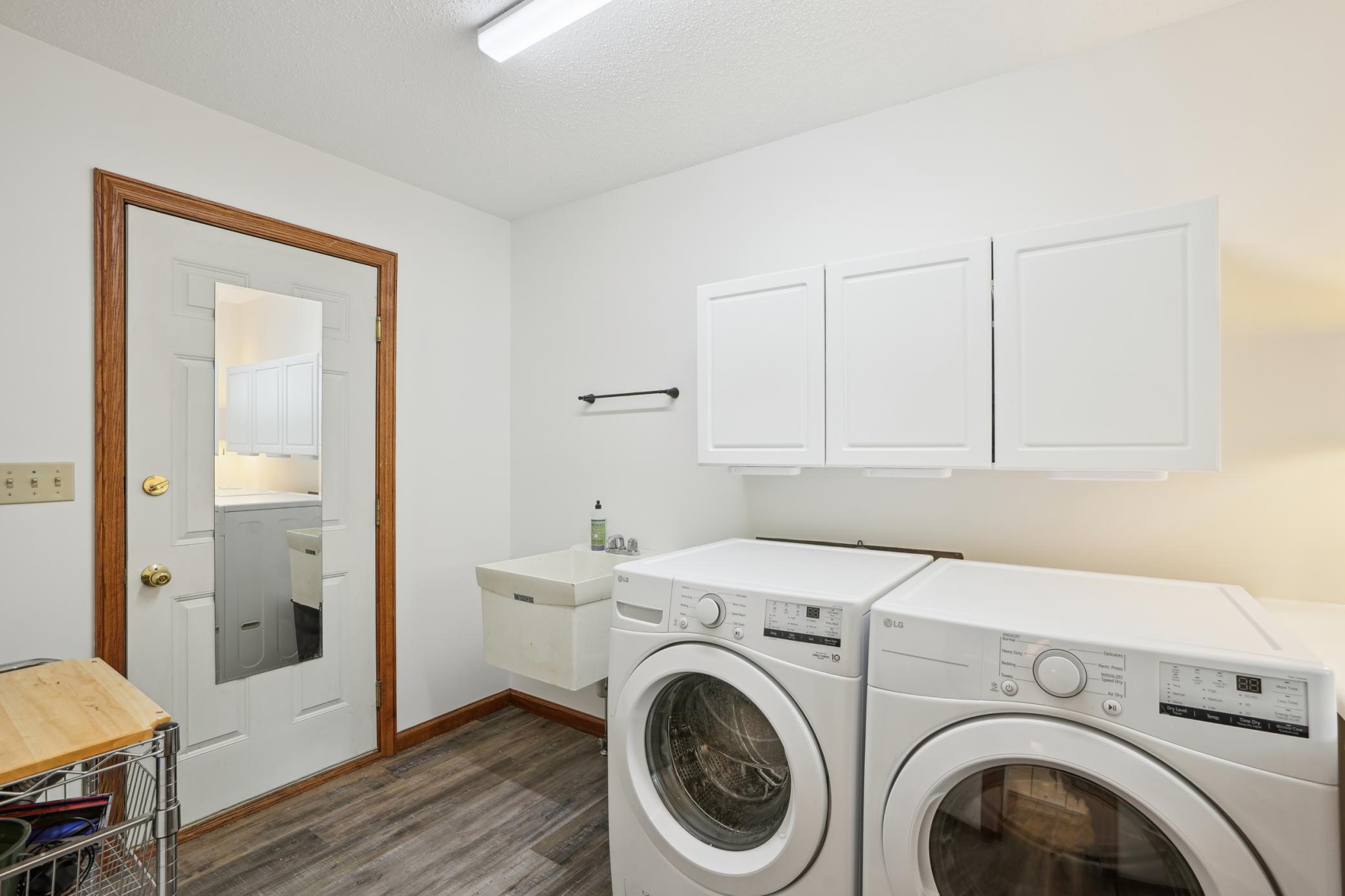 Large main floor laundry with room to organize and simplify daily routines.jpg