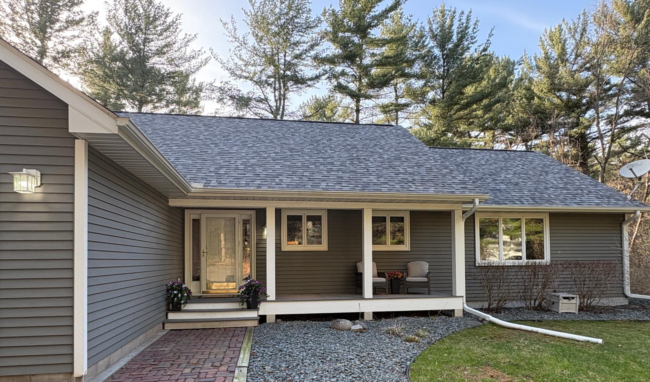 Attractive front porch enhances curb appeal and creates a warm, welcoming entry to the home.