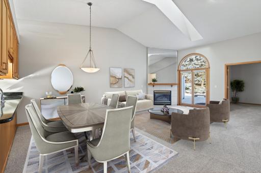Nice size livingroom/dining area with skylight