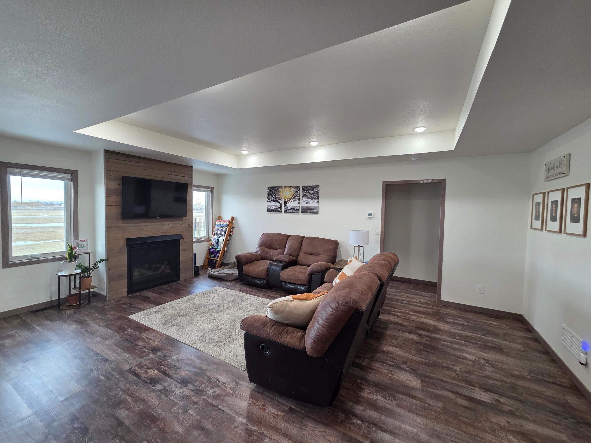 Living Room - check out the gorgeous tray ceilings!