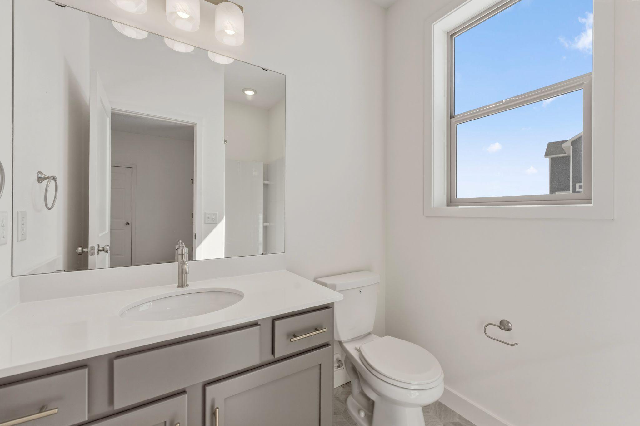 Main level bathroom has shower