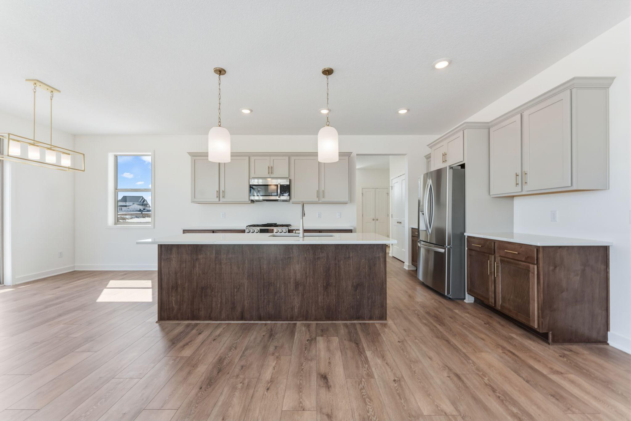 4 bar stools can fit at the center island overhang