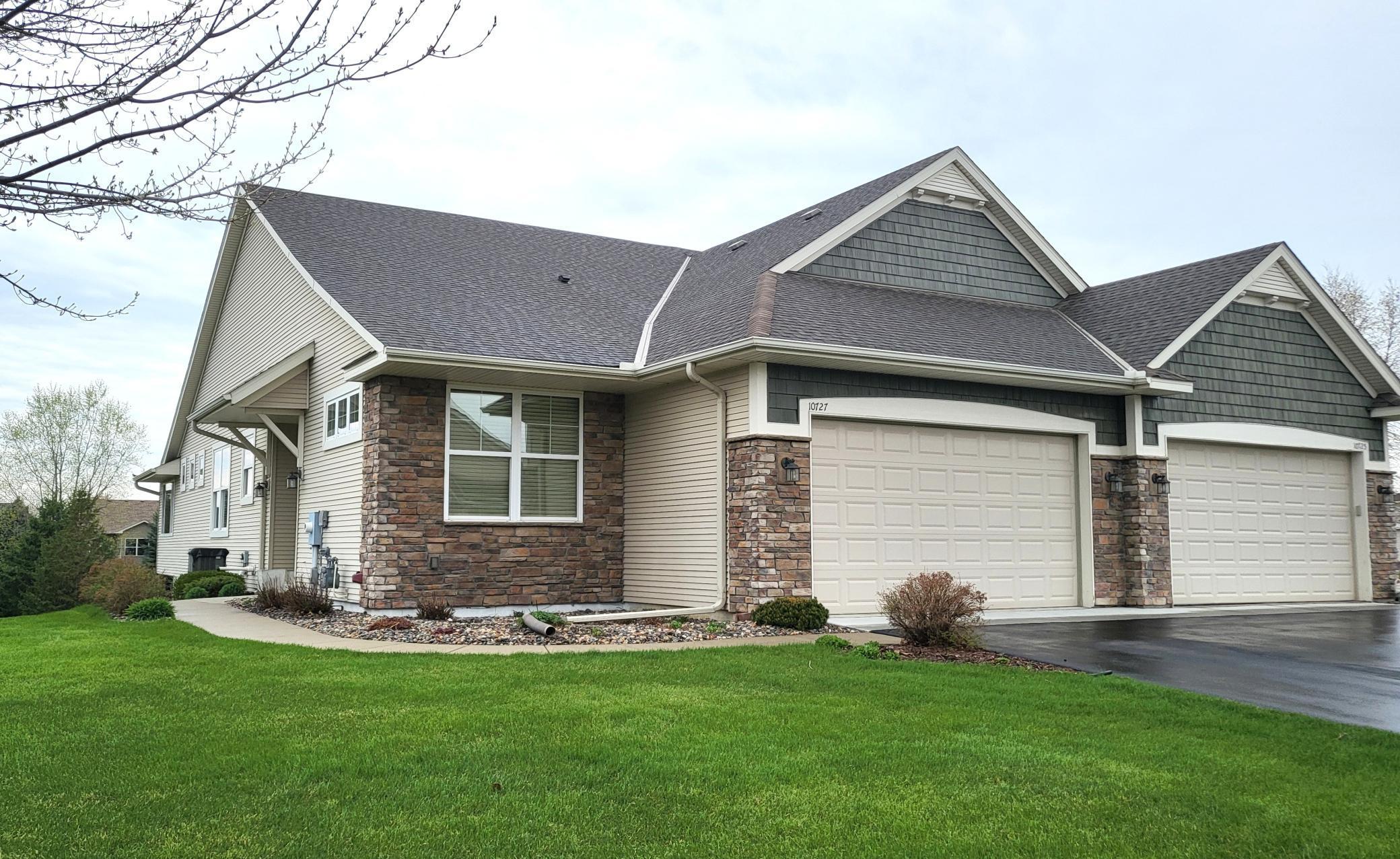 Welcome home to 10727 Kingsfield Lane, Woodbury MN 55129!