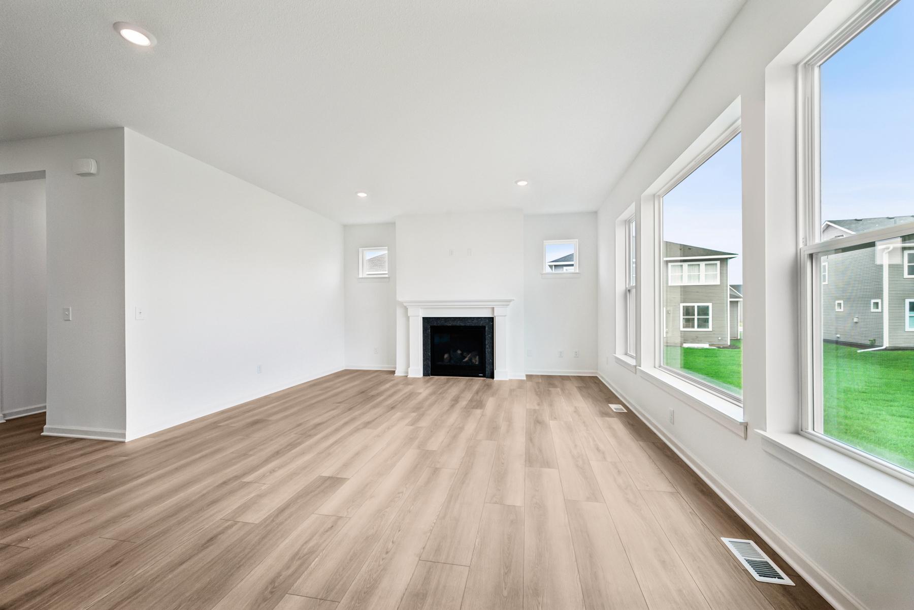 A vast living space with 9' ceilings and windows with unobstructed views.