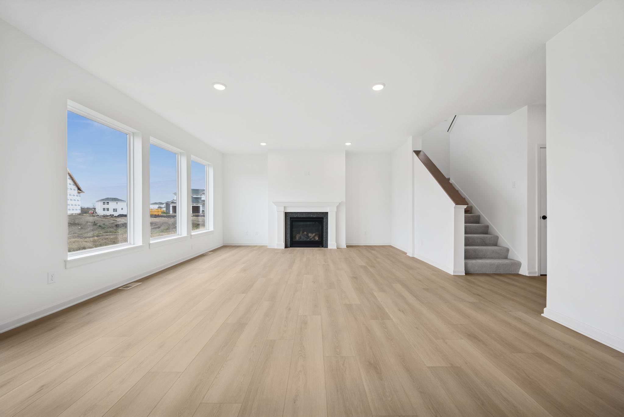 Living room w gas fireplace *Photos of a similar home*